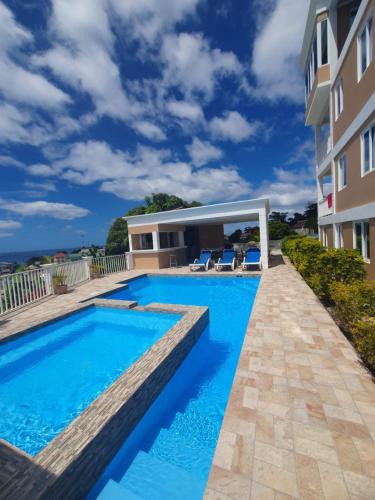 Roseau Apartment | VIP Residence Two Bedroom Poolside Haven