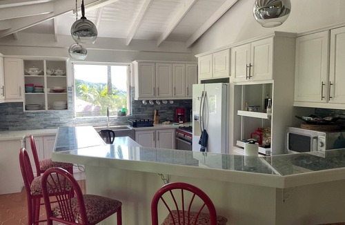 Roseau House | Aura spacious three-bedroom tropical retreat with air-conditioned bedrooms,