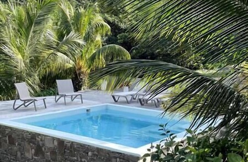 Calibishie Apartment | Bougainvillea Garden Caribbean suite with pool