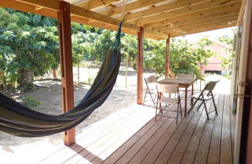 Calibishie House | Dado's Place - 2 bedroom house with AC and verandah