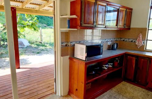 Calibishie House | Dado's Place - 2 bedroom house with AC and verandah