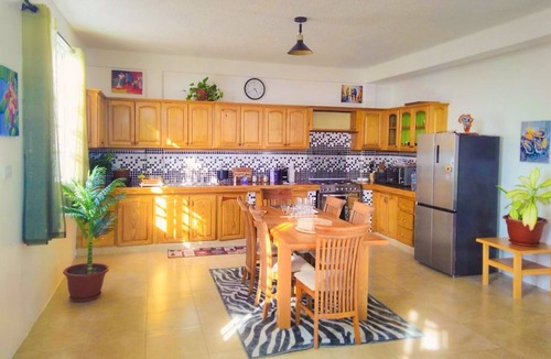 Castle Comfort House | Hillside home with stunning sea views next to Roseau