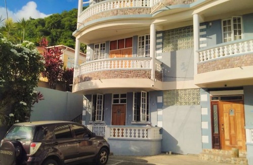 Castle Comfort House | Hillside home with stunning sea views next to Roseau