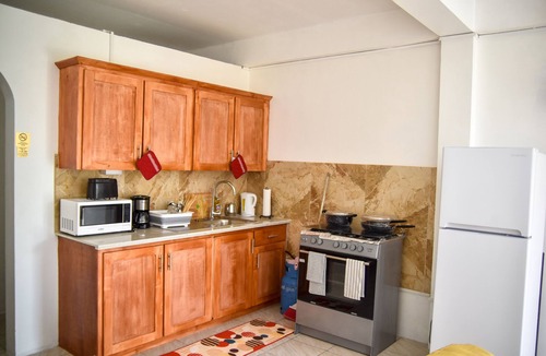Castle Comfort Apartment | Large 2 Bedroom 2 Bathroom Apartment #4 in Roseau. Bus stops right in front!