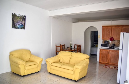 Castle Comfort Apartment | Large 2 Bedroom 2 Bathroom Apartment #4 in Roseau. Bus stops right in front!
