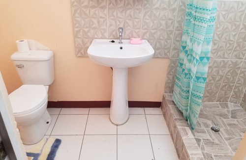 Canefield House | Property is located in a middleclass community, and fifteen minutes from Roseau.