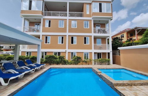 Roseau Apartment | Stunning Ocean & Pool View 2-Bedroom Apartment, 2 mins from the city.