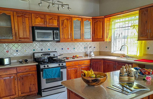 La Plaine Villa | Sunrise Bliss Villa w/Hot Tub, King Bd+Mountain and Ocean View