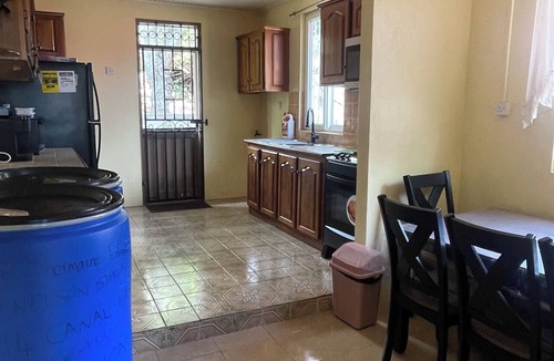 Roseau House | The Yellow Porch, a furnished 2/3 bedroom house with AC in Goodwill, Roseau