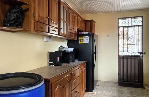 Roseau House | The Yellow Porch, a furnished 2/3 bedroom house with AC in Goodwill, Roseau