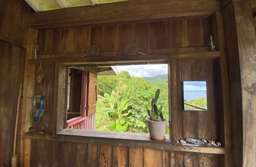 Grand Bay House | Wooden house with an ocean view