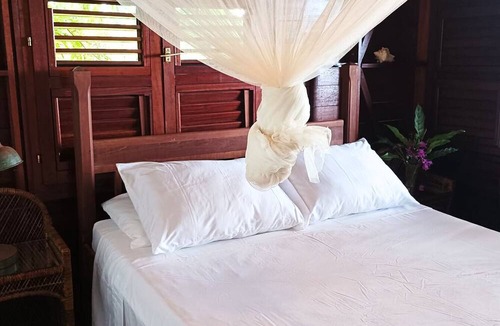 Calibishie House | Family home offering spectacular views and spacious indoor & outdoor living.