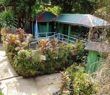 Wotten Waven House | Tia's Bamboo Cottages Restaurant, Bar & Sulphur Spa